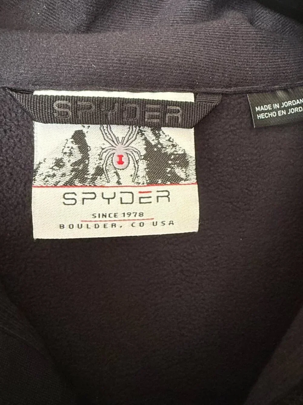 Grey and black Spyder quarter zip sweater